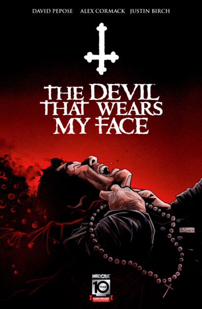 A comic book cover showing a white cross above the title "The Devil That Wears My Face." Below the title, a man in distress holds a rosary while dark tendrils surround him against a red and black background.