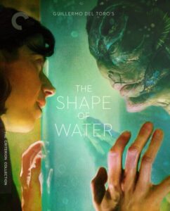 A woman and an amphibious humanoid creature touch hands through a glass surface, with the title "The Shape of Water" and director Guillermo del Toro's name displayed. Criterion Collection branding is visible.
