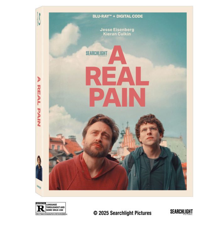 A Blu-ray cover titled "A Real Pain" featuring two men standing outdoors, with a cloudy sky and rooftops in the background. Names on the cover: Jesse Eisenberg, Kieran Culkin.