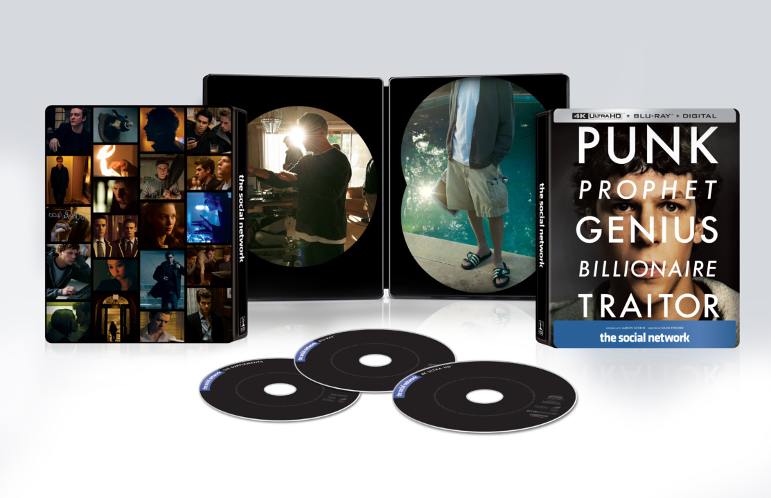 The image displays a deluxe edition of "The Social Network" movie set, including a box, three discs, and two open cases with film stills and character art.