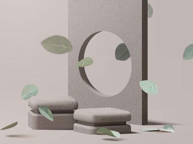 Abstract scene with a circular cutout in a vertical slab, two stone blocks, and floating green leaves.