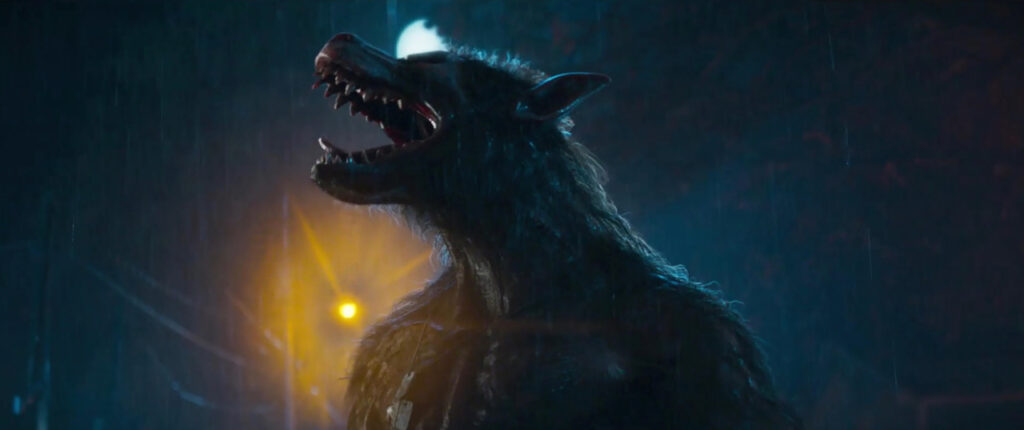 A werewolf stands under rainfall, howling with its head raised. Electric lights glow in the background.