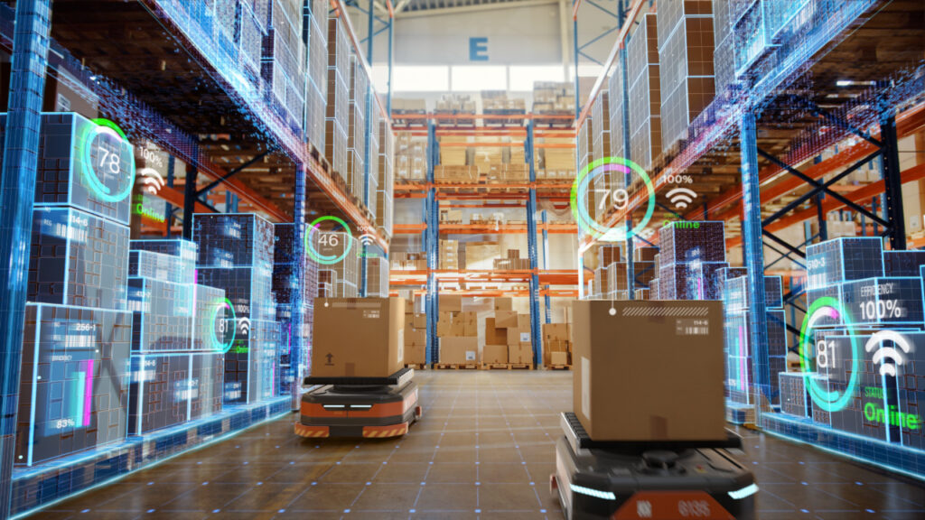 Automated robots move boxes in a high-tech warehouse, with digital displays showing data and analytics.