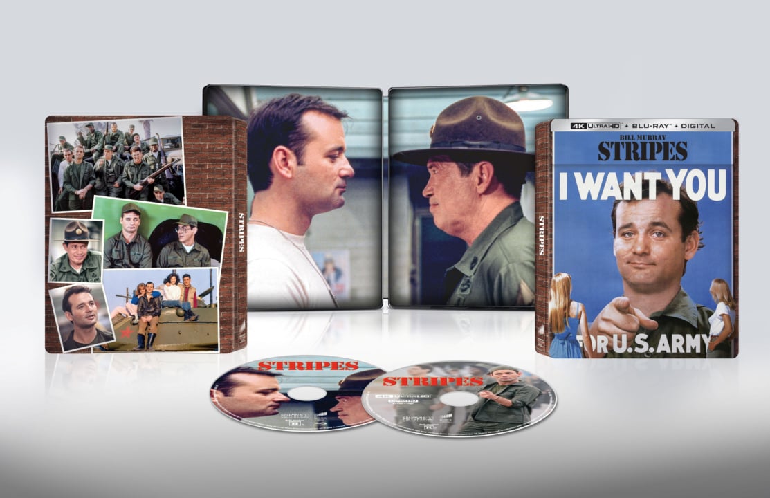 DVD set of the movie "Stripes" featuring cover art with two characters, interior artwork, and two discs. DVD case displays military-theme graphics and promotional images.