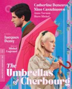 Illustrated movie poster for "The Umbrellas of Cherbourg" featuring a man in profile and a woman holding a pink umbrella against a floral background.