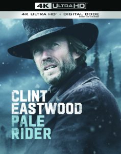 Cover art of "Pale Rider" 4K Ultra HD edition, featuring a man in a black hat and coat standing outdoors with trees in the background.