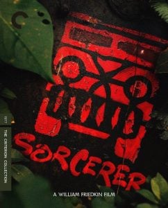 Red and black painted artwork on a rough surface with the text "Sorcerer" and "A William Friedkin Film," surrounded by green leaves. Criterion Collection label on the left.