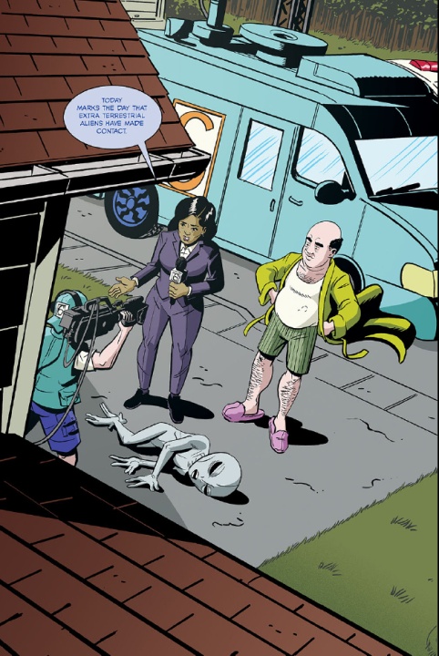 A reporter talks on camera next to a bald man in shorts, with an alien figure on the ground. A news van is parked nearby.