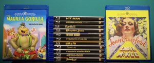 A collection of Blu-ray cases, including "Magilla Gorilla: The Complete Series," several movie titles stacked in the middle, and "Sadie McKee" with Joan Crawford on the right.