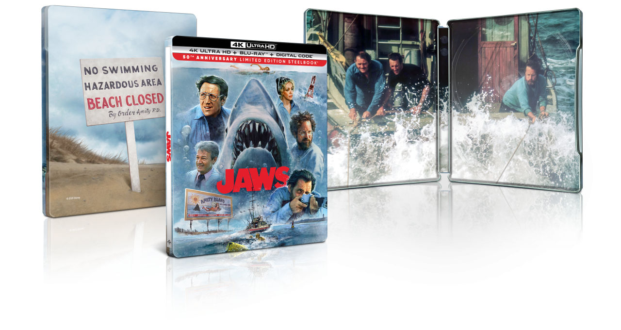 Jaws 4K Ultra HD limited edition steelbook set with cover art, open case featuring characters on a boat, and a beach warning sign.
