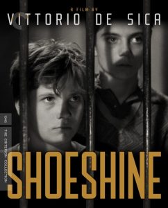 Two boys stand behind metal bars with serious expressions on the cover of the film "Shoeshine" directed by Vittorio De Sica.