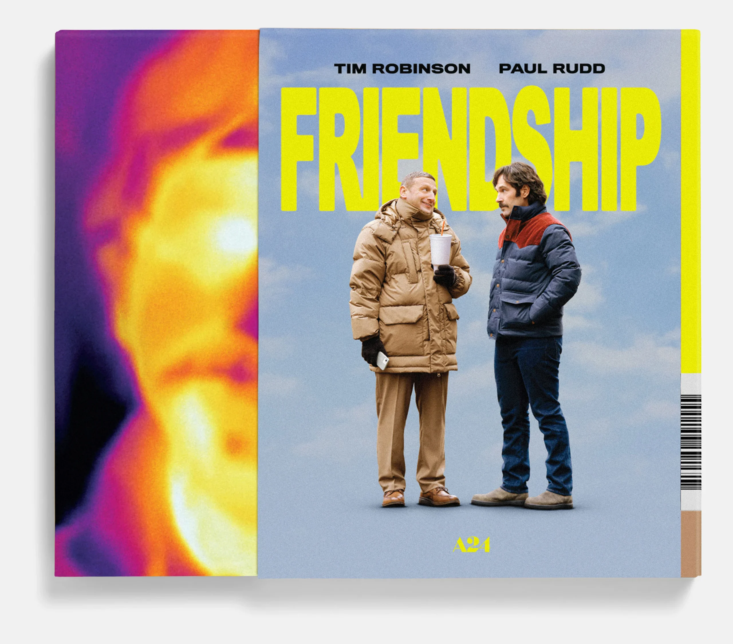 Two men in winter jackets stand and talk in front of a yellow "FRIENDSHIP" sign; one holds papers. Left side of the image features a colorful, heatmap-like effect.
