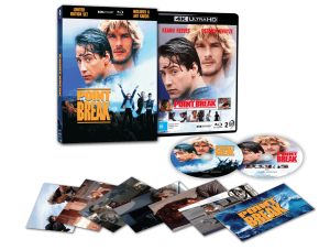 Limited edition 4K Ultra HD and Blu-ray set of "Point Break" with box, discs, art cards, and film stills featuring Keanu Reeves and Patrick Swayze.