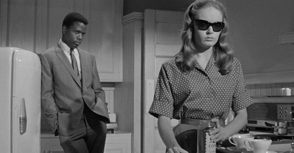 A man and woman in a room.
