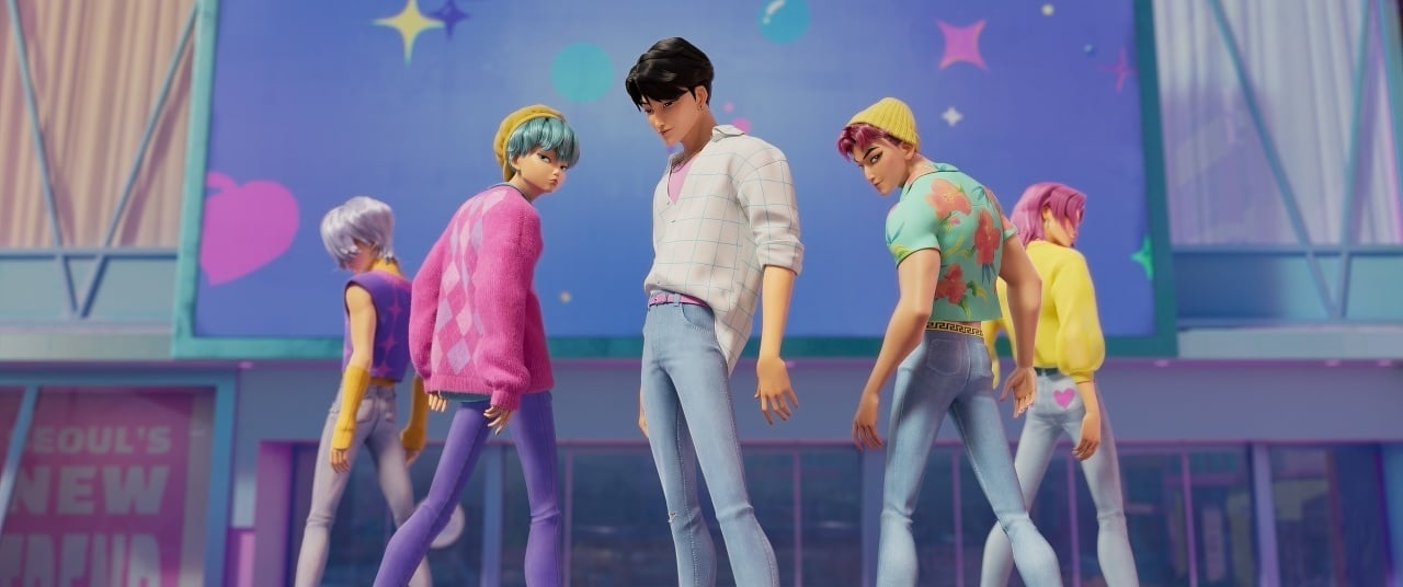 Five animated characters with colorful hair and casual clothing stand posing in front of a modern building with a bright, graphic background.