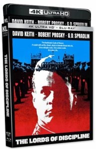Blu-ray case of "The Lords of Discipline" featuring a black-and-white portrait of a man in uniform, with a red and blue background and military figures behind him.