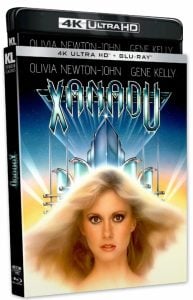 4K Ultra HD Blu-ray cover of "Xanadu" featuring Olivia Newton-John’s face in front of a stylized cityscape, with title and cast names at the top.