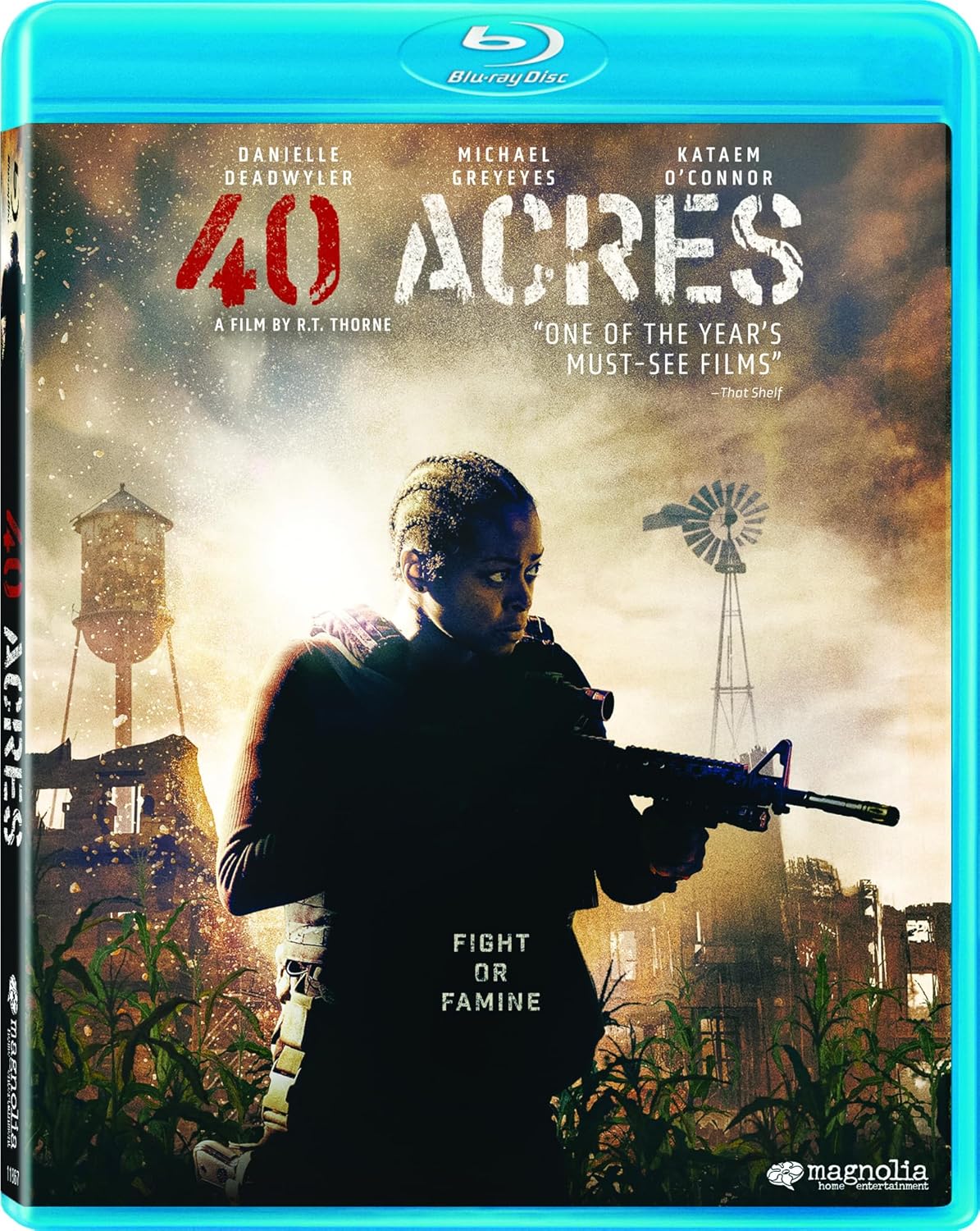 Blu-ray cover of the film "40 Acres" featuring an armed woman in tactical gear standing in a rural landscape with an abandoned house and windmill in the background.