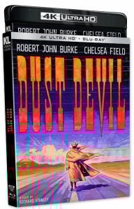 4K Ultra HD and Blu-ray cover for the film "Dust Devil," showing a lone figure in a coat and hat walking on a road with a vivid, stylized desert background.