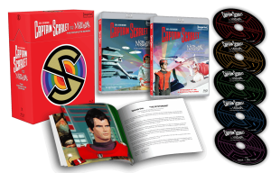 Box set of "Captain Scarlet and the Mysterons" Blu-ray, showing the outer box, two cases with cover art, a booklet, and six color-coded discs arranged in a row.