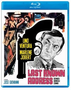 Blu-ray cover for the film "Last Known Address" featuring illustrated images of a man holding a gun, a woman, and a man’s face in front of a large gun graphic.