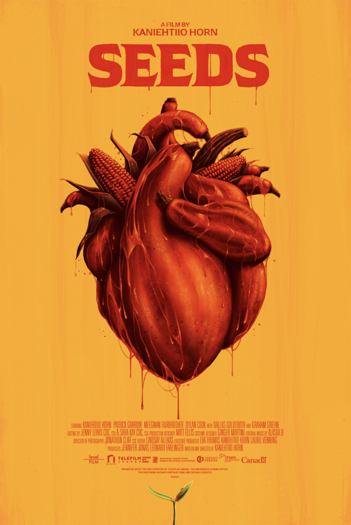 A stylized human heart blended with corn, beans, and squash is featured on an orange background beneath the title "SEEDS.