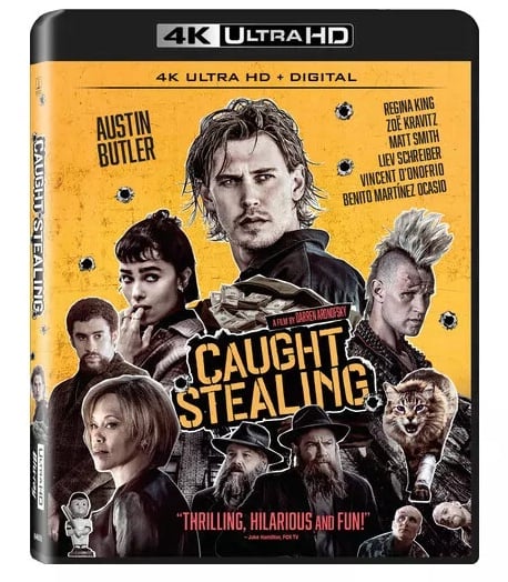 The cover of the 4K Ultra HD movie "Caught Stealing" features the main cast and title against a yellow background with black-and-white silhouettes and review quotes.