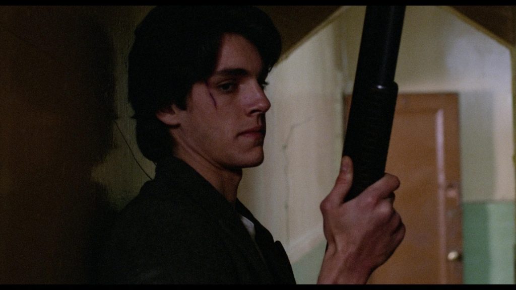 A man holding a gun.