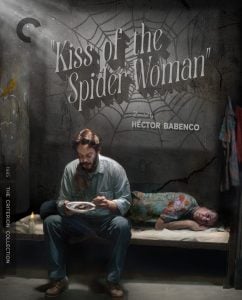 A man sits eating on a prison bed while another person lies beside him, under a spiderweb design with the title “Kiss of the Spider Woman” and credits for director Hector Babenco.