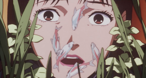 An animated close-up of a surprised person’s face surrounded by green leaves, with several small fish covering their face.