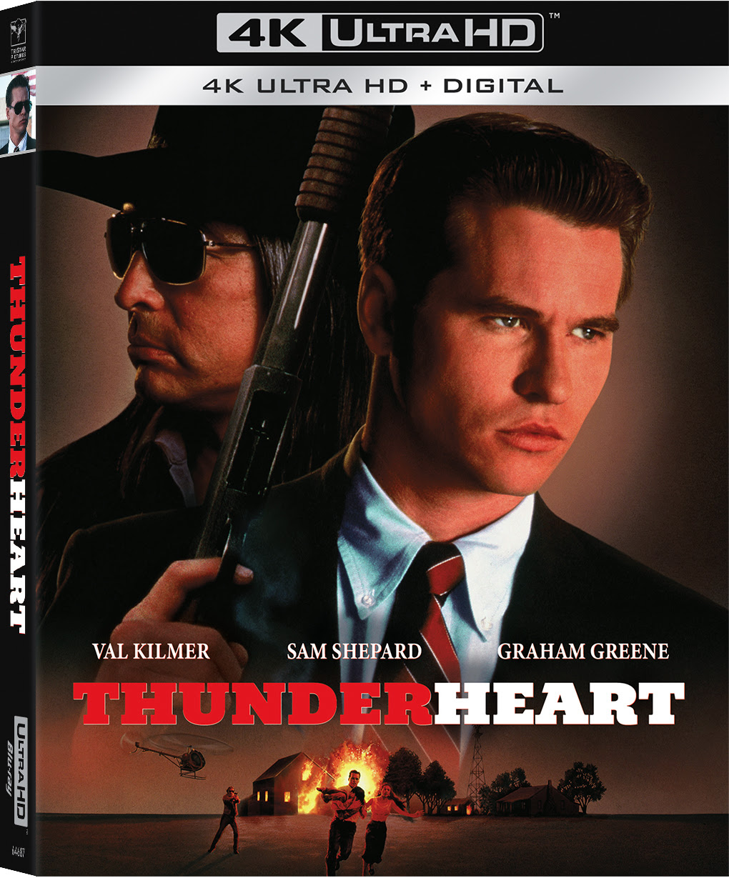4K Ultra HD cover of the film "Thunderheart" featuring two men in suits, one wearing sunglasses, with a burning house and police cars in the background.