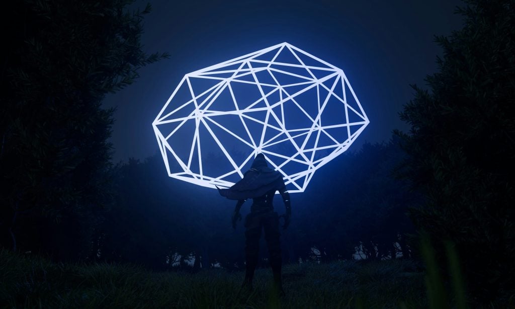 A person stands in a grassy area at night, silhouetted against a large, glowing geometric structure resembling a brain suspended in the air.