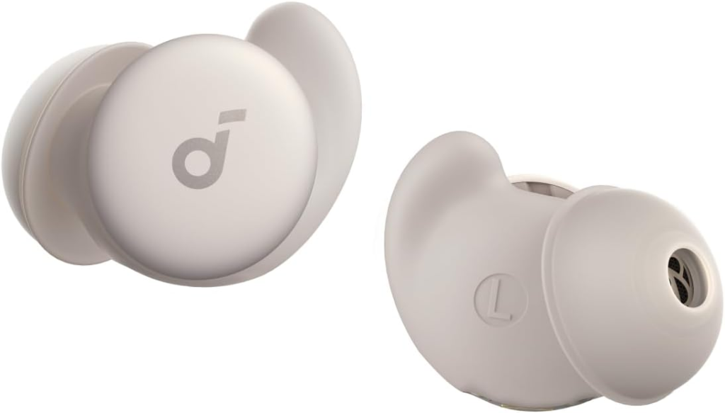 Two white wireless earbuds with silicone ear tips and the Soundcore logo, shown from different angles to display both the outer and inner sides.