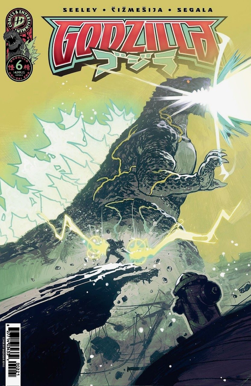 Comic book cover showing Godzilla shooting a beam from its mouth, causing destruction, with smaller figures fleeing in the foreground. Title and credits are displayed at the top.