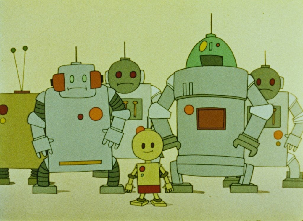 A group of cartoon robots stands together, with a small yellow robot in front and larger, variously shaped robots behind it.