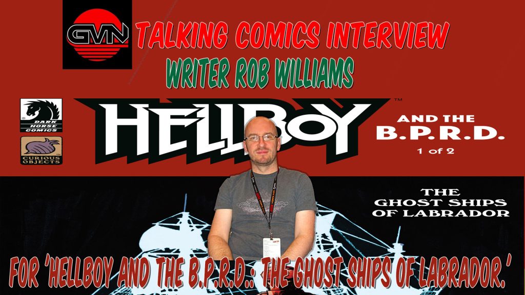 A man sits in front of a "Hellboy and the B.P.R.D." promotional backdrop for an interview about "The Ghost Ships of Labrador" comic.