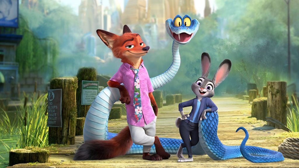 A cartoon fox, snake, and rabbit stand together on a wooden path in a colorful, animated city setting, all smiling confidently.