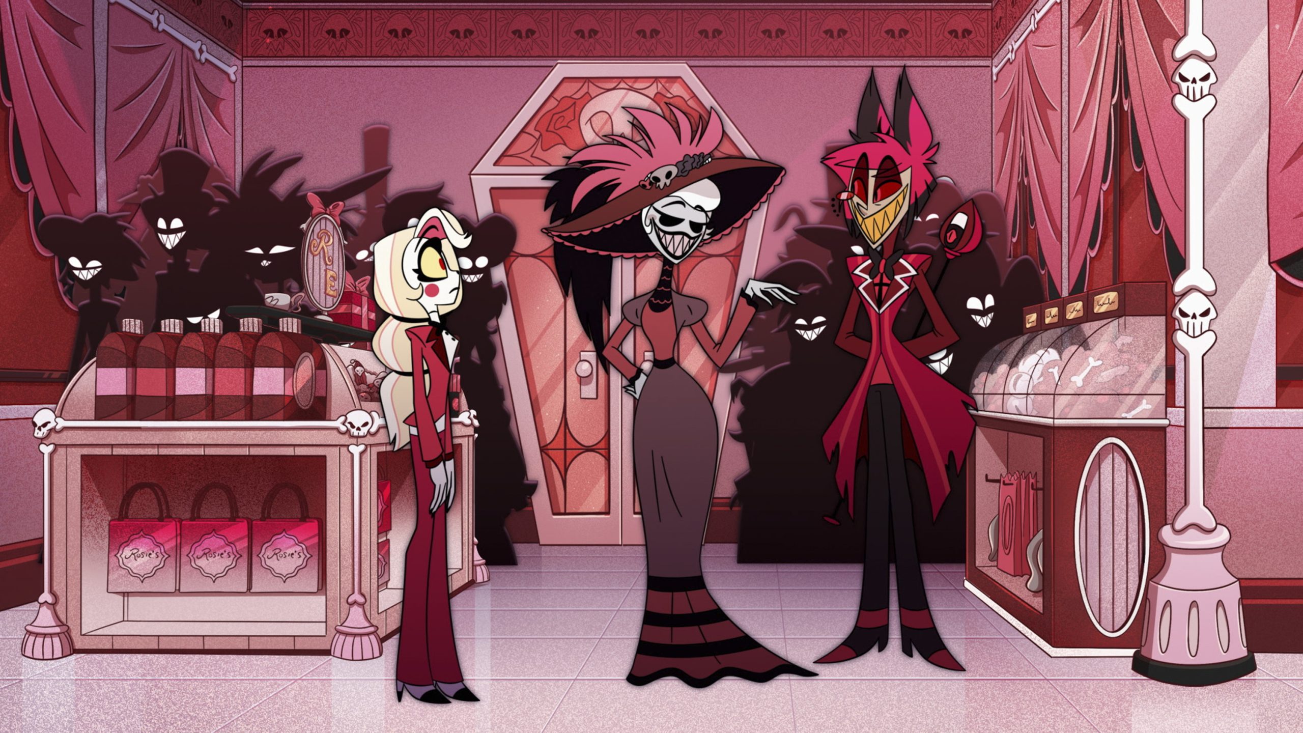Three animated characters stand in a pink, gothic-style shop with skull decorations, display cases, and shadowy figures in the background.