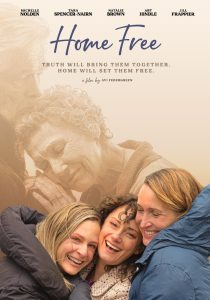 Three women smile and embrace outdoors in the foreground; above them, a faded image of two women sharing a comforting hug appears, with the title "Home Free" and cast names at the top.