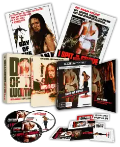 A collection of Blu-ray and DVD editions of the films "Day of the Woman" and "I Spit on Your Grave," including cases, discs, posters, and additional promotional materials.