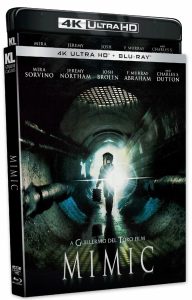 A Blu-ray cover for the film "Mimic" shows a person with a flashlight walking through a dark tunnel, surrounded by actor names and film credits at the top.