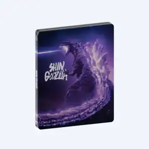 A steelbook case featuring purple-toned artwork of Godzilla shooting a laser beam from its mouth, with "Shin Godzilla" text displayed on the cover.