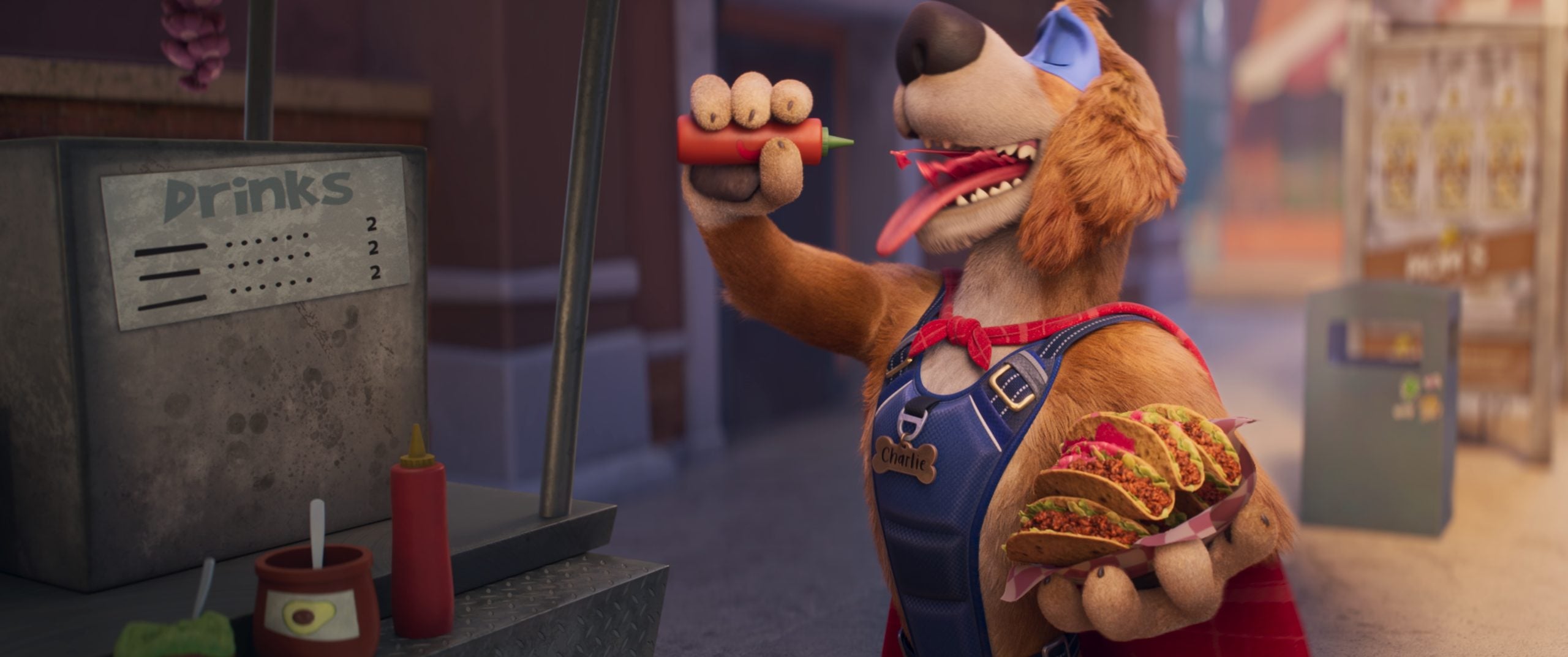 Animated dog in overalls and cape holds tacos and squeezes ketchup onto one, standing by a metal drink dispenser and condiment bottles.