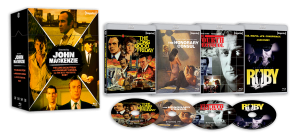 Box set titled "Directed by John Mackenzie" with four Blu-ray cases and discs for "The Long Good Friday," "The Honorary Consul," "Voyeur/Death by Misadventure," and "Ruby.