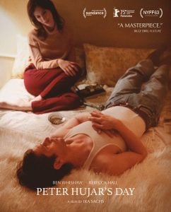 A woman sits on a bed while a man lies beside her, both in a softly lit room. Text shows film festival selections and the title "Peter Hujar’s Day.