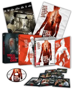 A collection of "Tell No One" movie merchandise, including DVDs, Blu-rays, posters, a disc, and photographic stills from the film.
