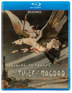 Blu-ray cover of "The Thief of Bagdad" featuring an illustration of a man riding a flying horse over a city, with the film title and "Douglas Fairbanks" prominently displayed.