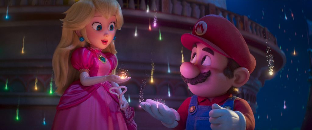 Princess Peach and Mario stand together at night, each holding glowing sparkles in their hands, with fireworks in the background.