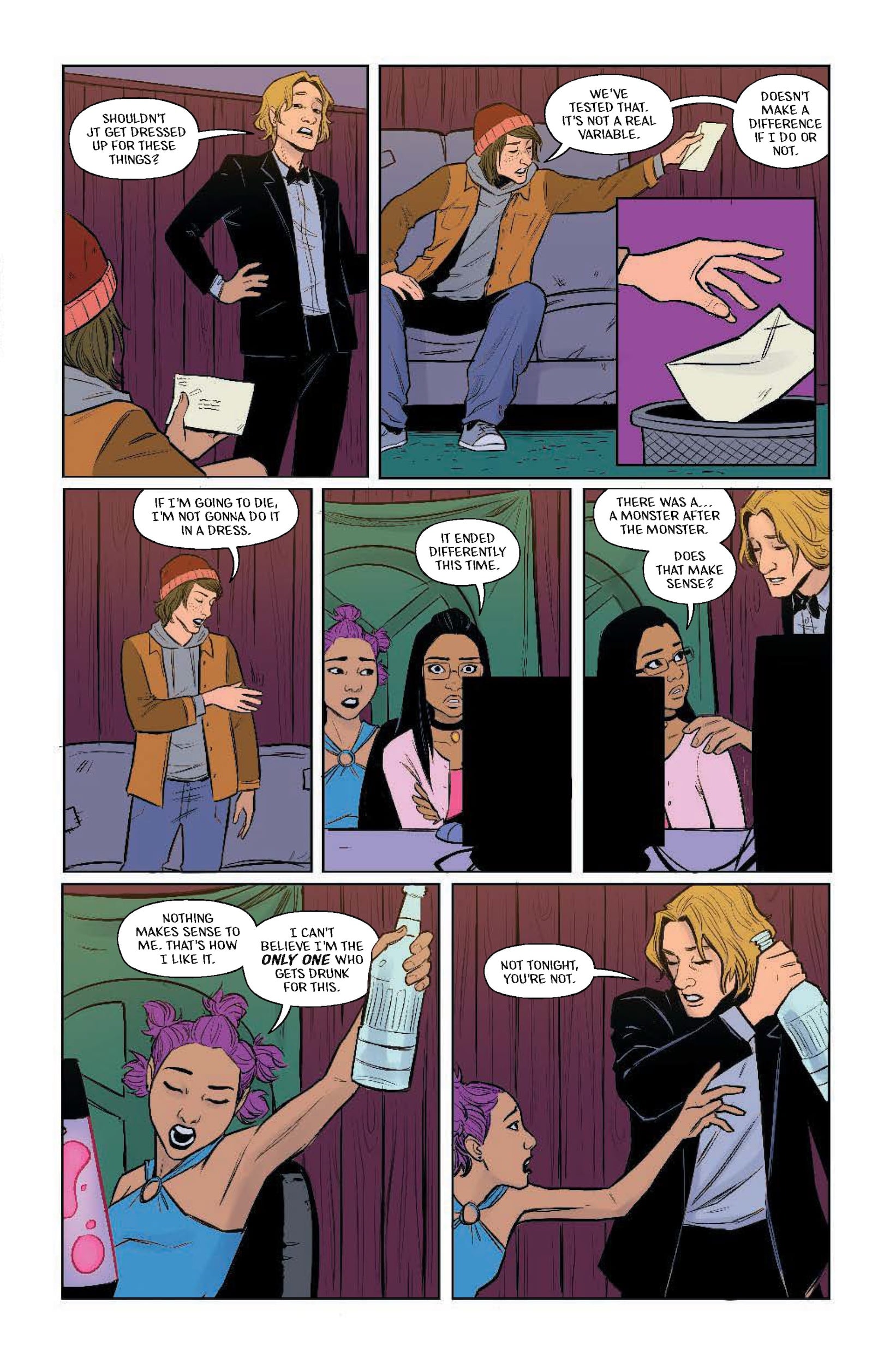 A group of young adults talk and drink in a living room. One woman, sitting on the floor, offers a drink to a reluctant man in a suit as others watch and converse.