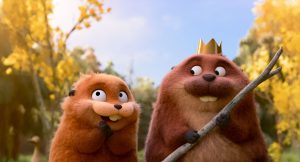 Two animated beavers stand side by side outdoors; one is wearing a gold crown and holding a stick, both have wide eyes and are smiling.